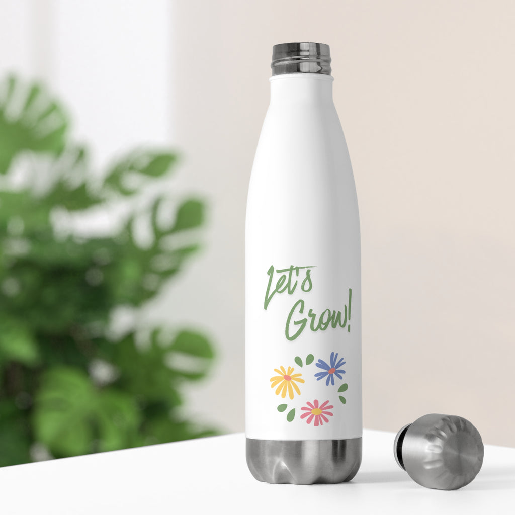 White water bottle with floral design and name 'Hannah' on a light background