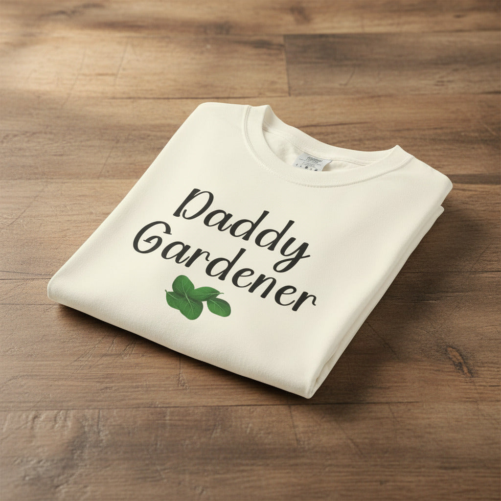 White t-shirt with 'Daddy Gardener' text and leaf graphic on a gradient background