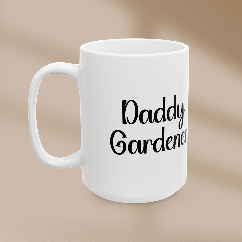 White mug with 'Daddy Gardener' text on a beige background