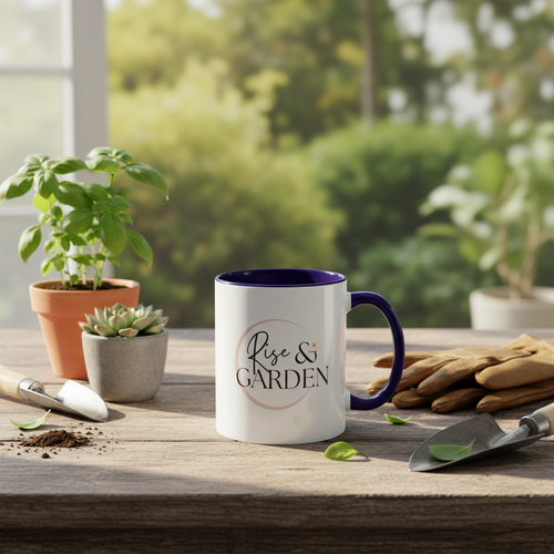 White mug with purple interior and handle on a table with gardening tools and plants