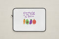 Laptop sleeve with cartoon vegetables and 'Gardening is My Time to Shine' text on a white background