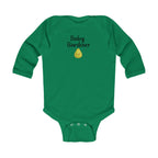 Green baby onesie with 'Baby Gardener' text and a small graphic on a white background