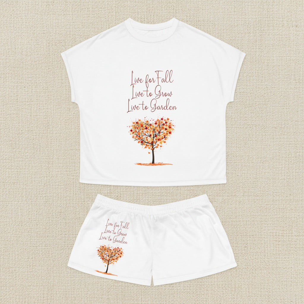 White t-shirt and shorts set with autumn-themed design and text on a white background