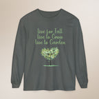 Gray long-sleeve shirt with green tree graphic and text on a beige background