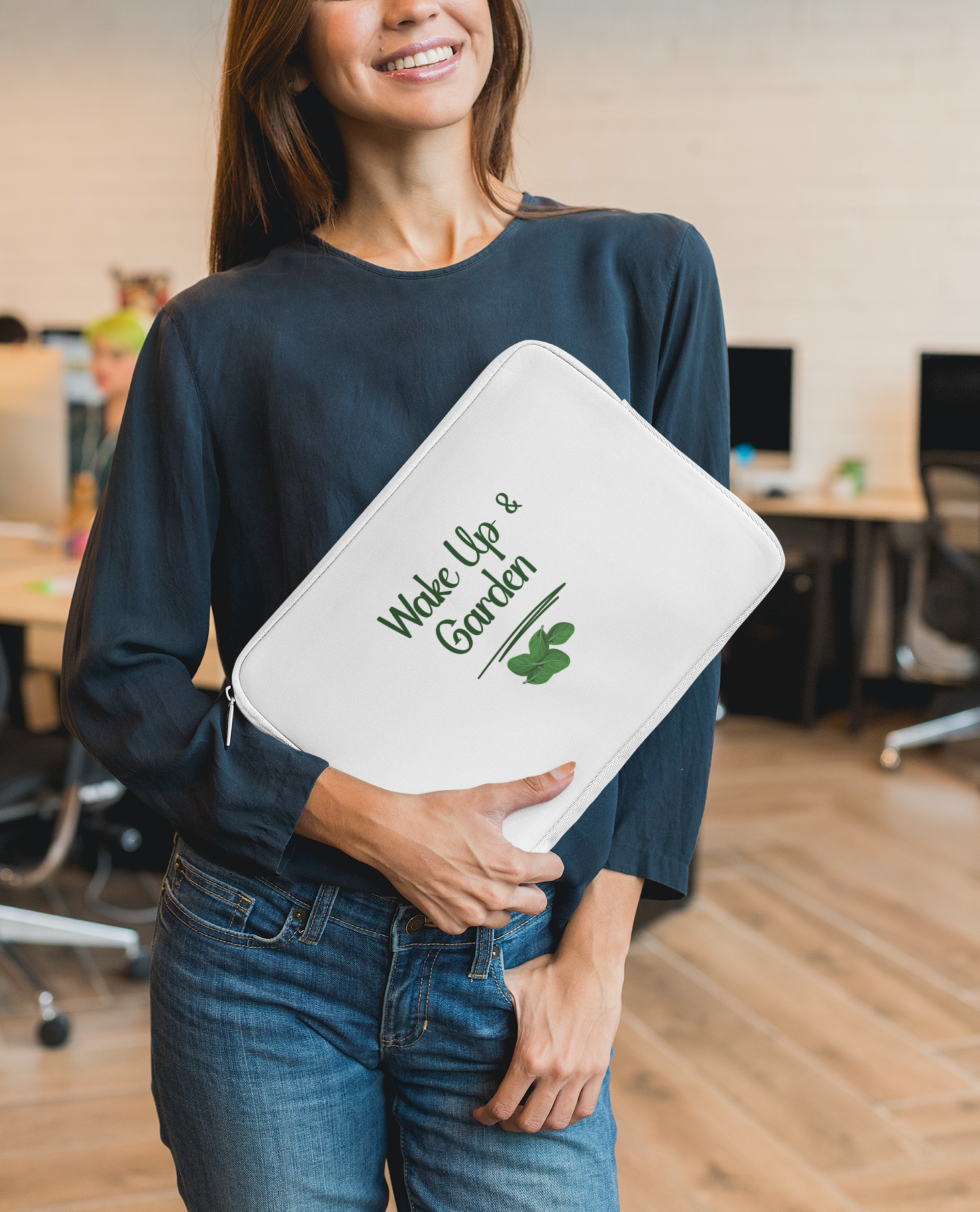 Woman holding a white folder with text and a logo in an office setting