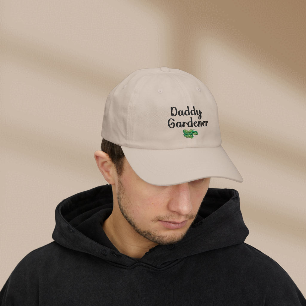 Man wearing a beige cap with 'Daddy Gardener' text on a beige background