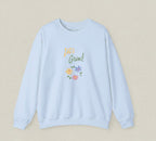 Light blue sweatshirt with 'Let's Grow!' text and floral design on a white background