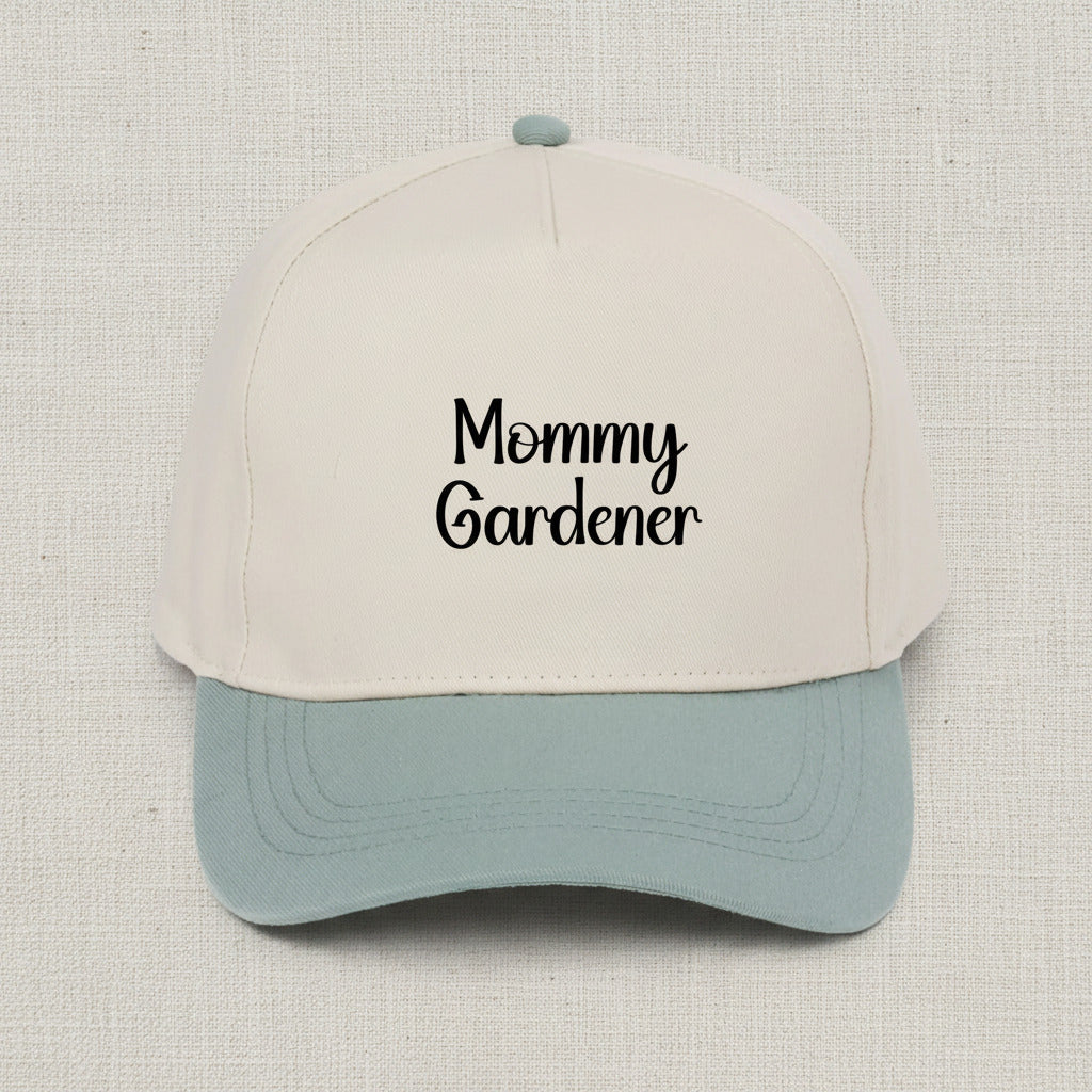 Beige and light blue cap with 'Mommy Gardener' text on a white background