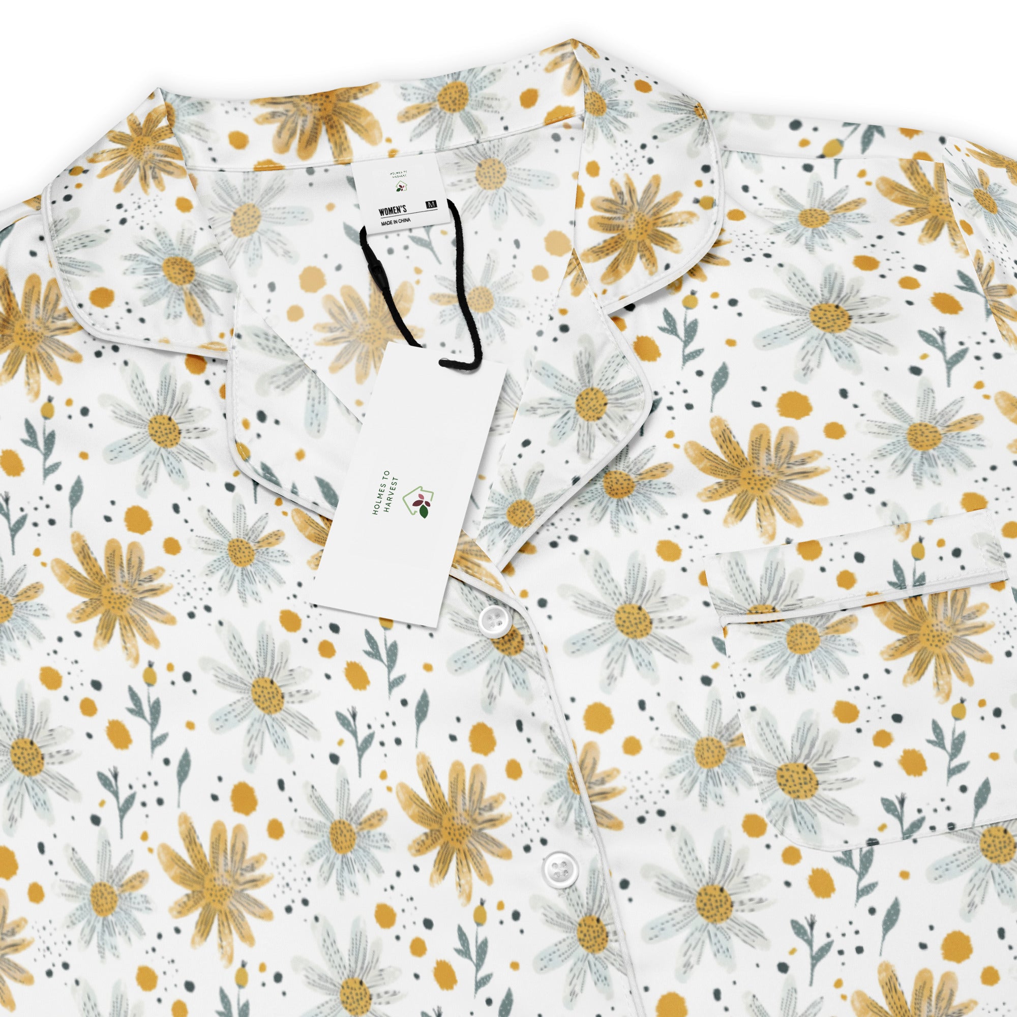 Floral patterned shirt with yellow flowers on a white background