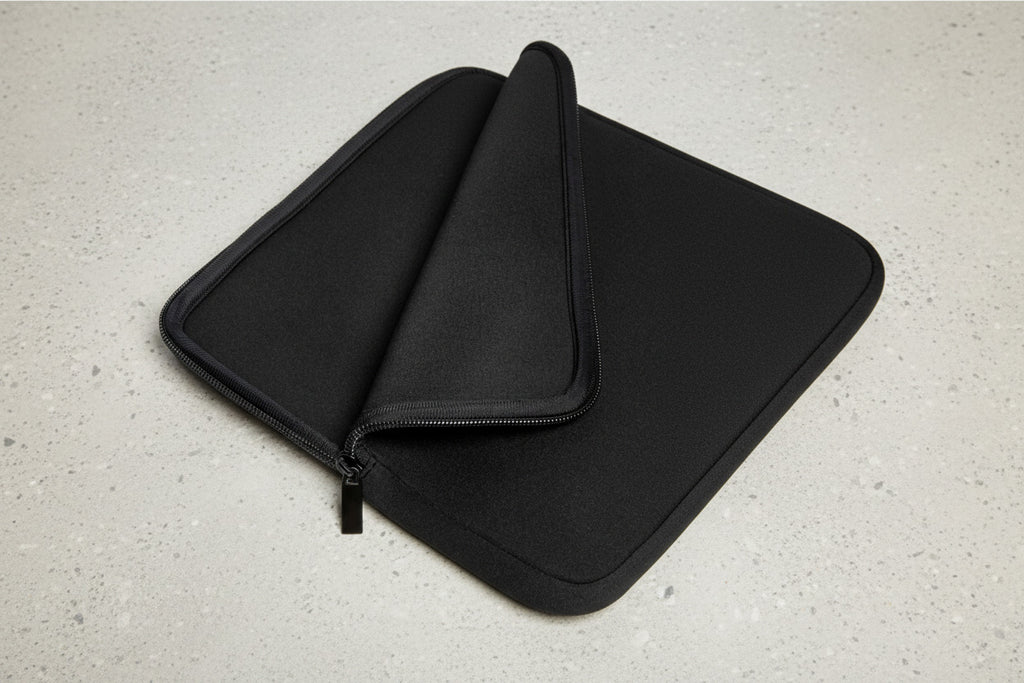 Black zippered pouch on a white background