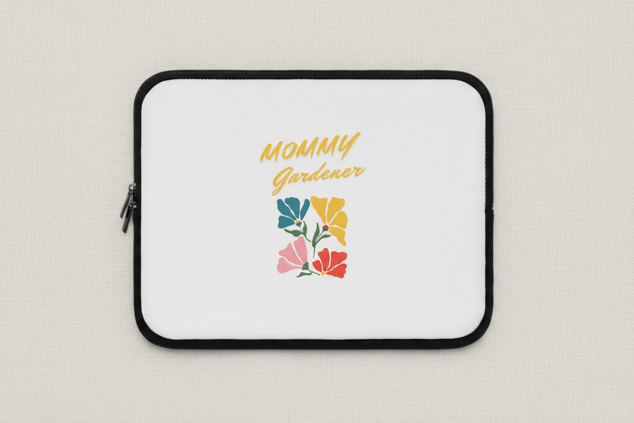Laptop sleeve with 'Mommy Gardener' text and colorful floral design on a white background