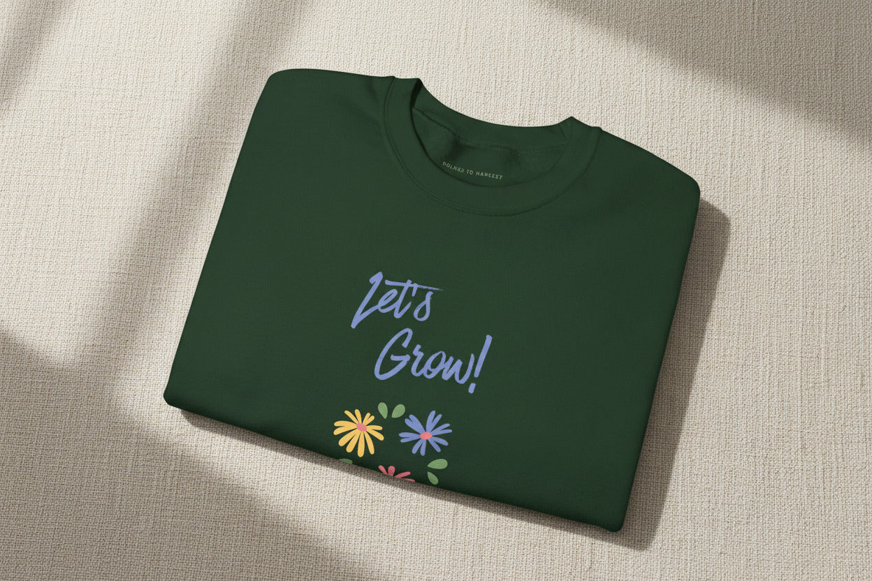 Folded purple shirt with white graphic and text on a white background