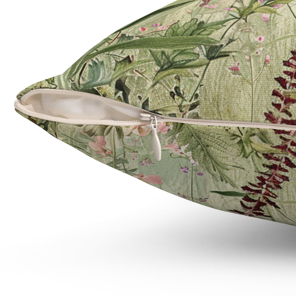 Floral-patterned pillow with a zipper on a white background