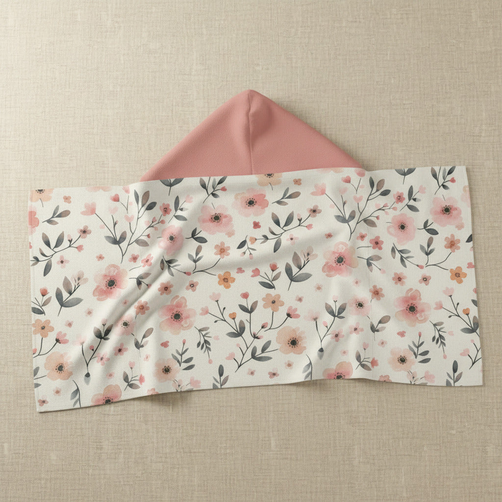 Floral-patterned envelope with a pink interior on a white background