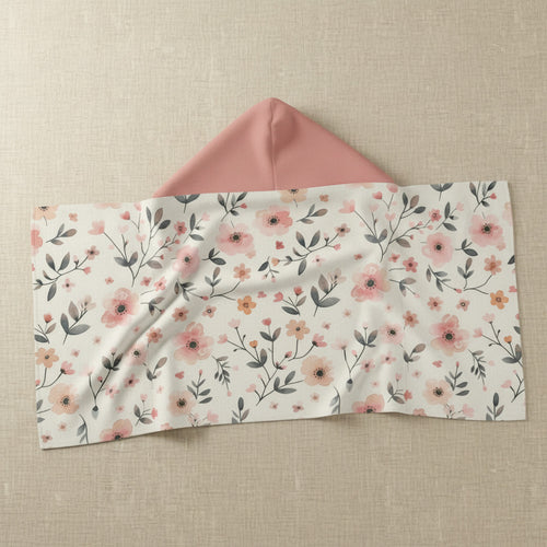 Floral-patterned envelope with a pink interior on a white background
