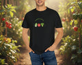 Man wearing a black t-shirt with vegetable graphics on a beige background