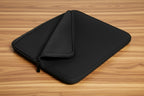 Black zippered pouch on a white background