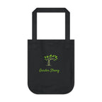 Black tote bag with green tree and 'Garden Strong' text on a white background