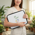 White pouch with 'Let's Grow!' text and floral designs on a white background