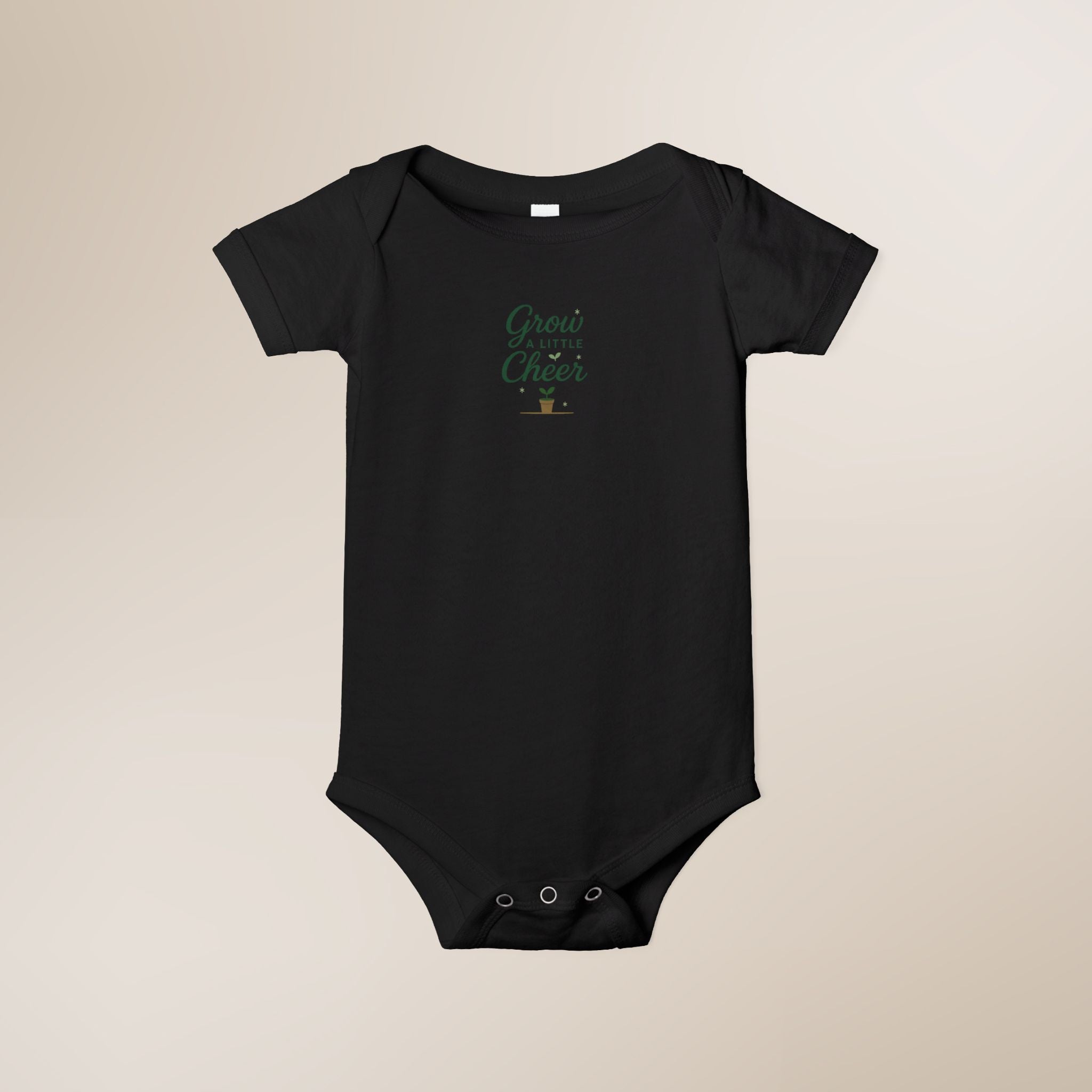Black baby onesie with text on a beige background