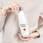 Person holding a white water bottle with 'Gardener in Training' text and tomato graphic.
