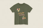 Green t-shirt with 'Spring Into Gardening' text and floral designs on a white background