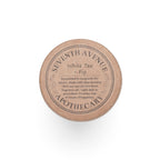 Seventh Avenue Apothecary candle lid on a white background