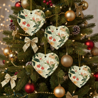 Decorative Christmas tree with floral heart ornaments and colorful baubles.