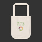 Beige tote bag with 'Mommy Gardener' text and floral design on a white background