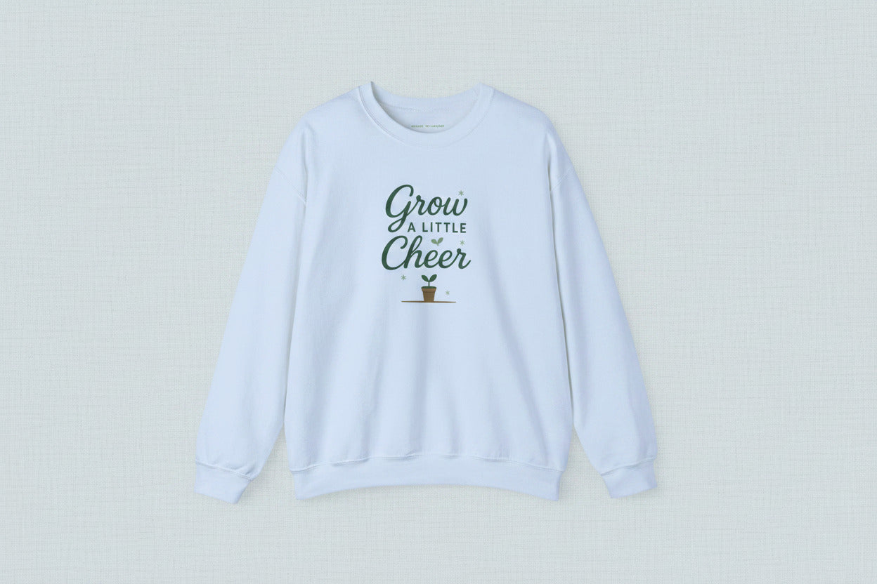 Light blue sweatshirt with 'Grow a Little Cheer' text on a white background