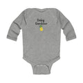 Gray baby onesie with 'Baby Gardener' and a pineapple graphic on a white background