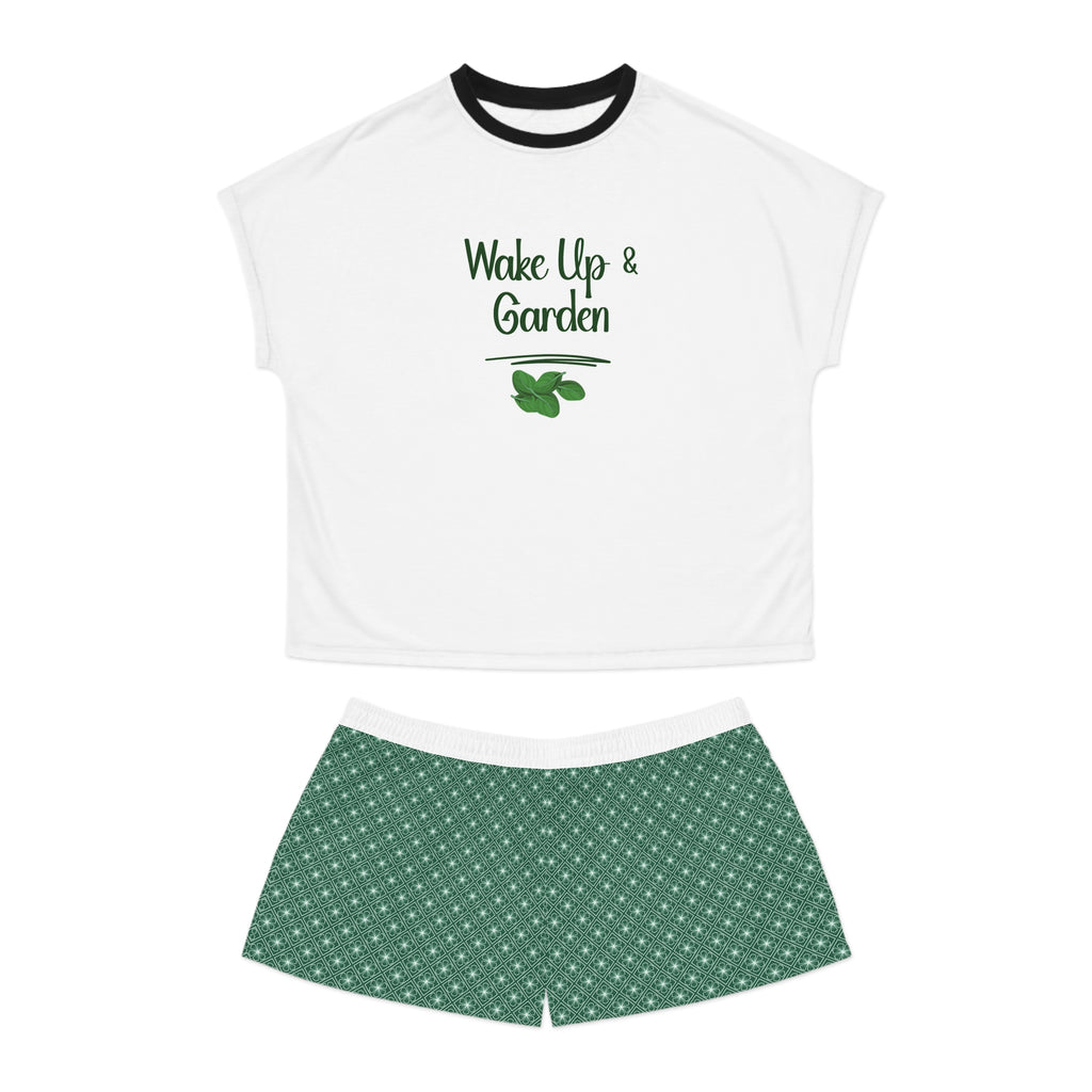 White t-shirt with 'Wake Up & Garden' text and green shorts on a white background