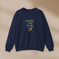 Navy blue sweatshirt with 'Gardening is My Therapy!' text and heart design on a beige background