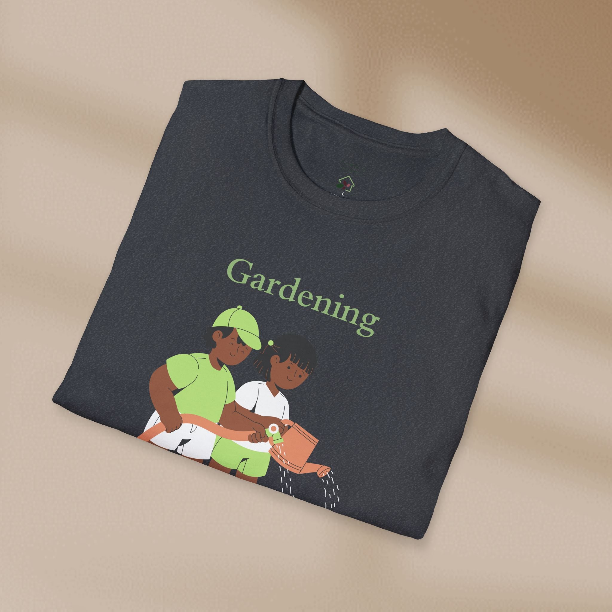 Folded t-shirt with 'Gardening' graphic on a beige background