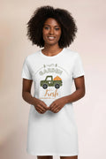 White t-shirt with a graphic of a green truck and 'Garden Fresh' text on a beige background