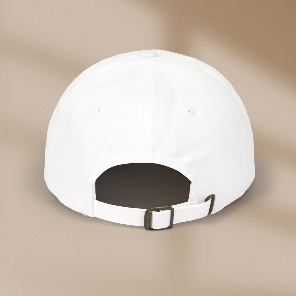 White cap with a brown buckle on a beige background