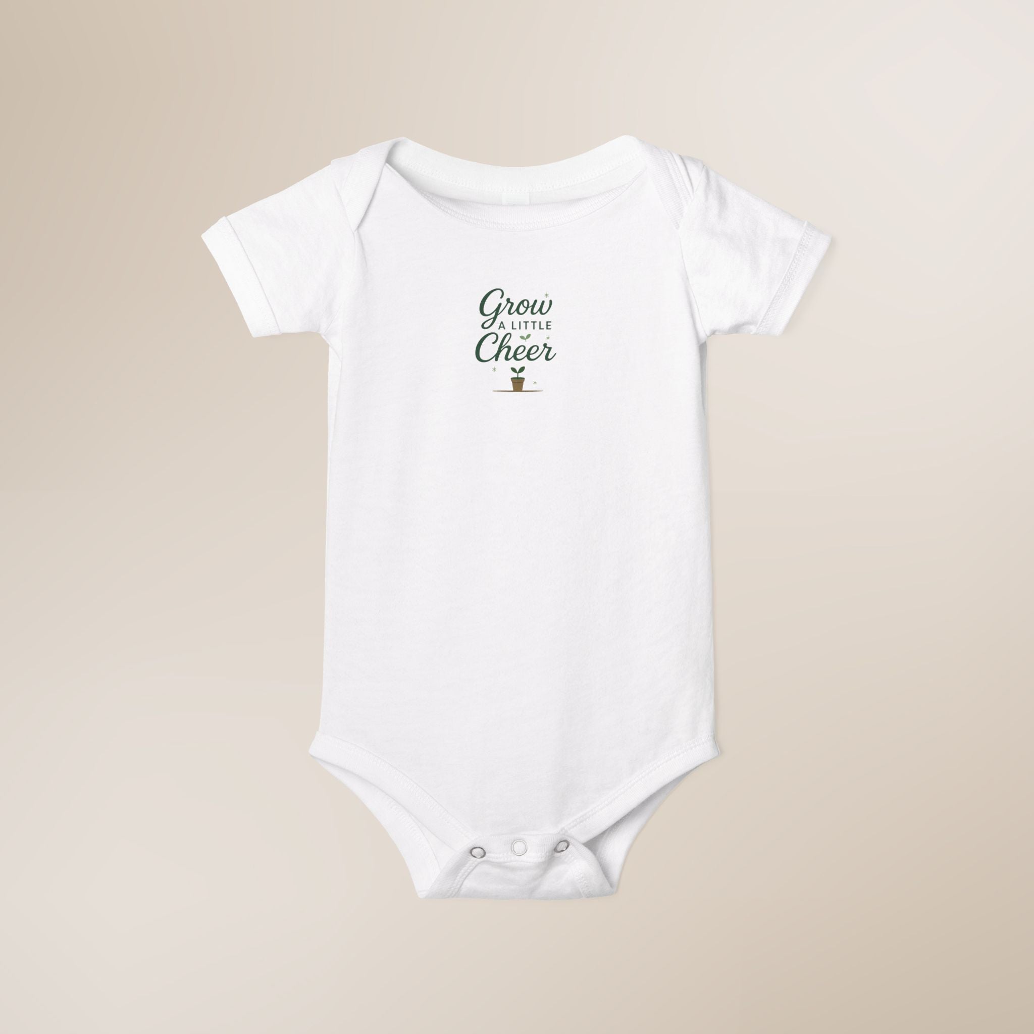 White baby onesie with text and graphic on a beige background
