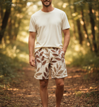 Off-white leaf print shorts with elastic waistband, relaxed above-knee fit