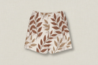 Floral shorts on a textured beige background