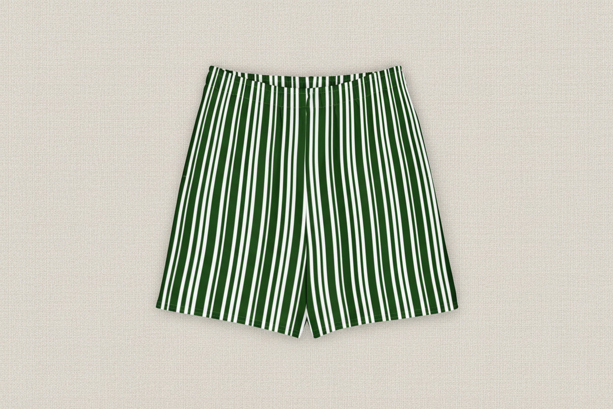 Green and white striped shorts on a light gray background