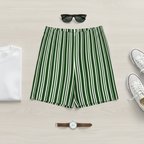 Green and white striped shorts with a white t-shirt, white sneakers, sunglasses, and a watch on a light gray background.