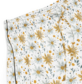 Floral patterned shorts with yellow flowers on a white background