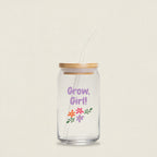 Glass jar with straw and wooden lid, featuring 'Grow, Girl!' text and floral designs on a white background.