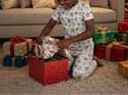 Kids pajama top with red snowflake print and short sleeves, all-over pattern