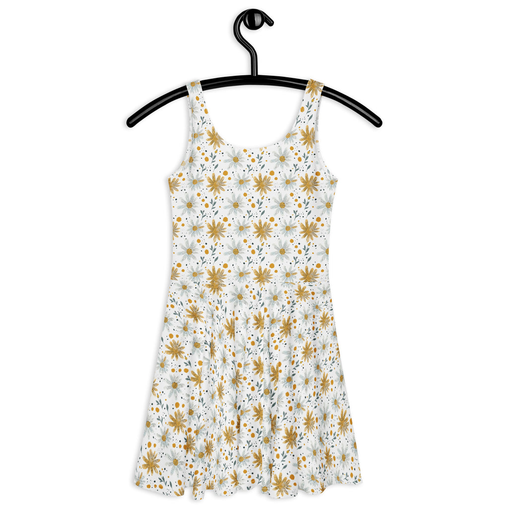 Floral dress on a hanger against a white background