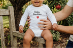 Baby Gardener Apple Onesie lifestyle photo with apple tree