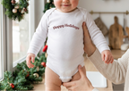 Baby girl in White in a festive kitchen setting