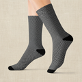 Patterned socks worn by a person on a white background