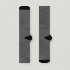 Black and gray patterned socks on a white background