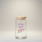 Glass tumbler with straw and wooden lid featuring 'Grow, Girl!' text and floral designs on a white background.